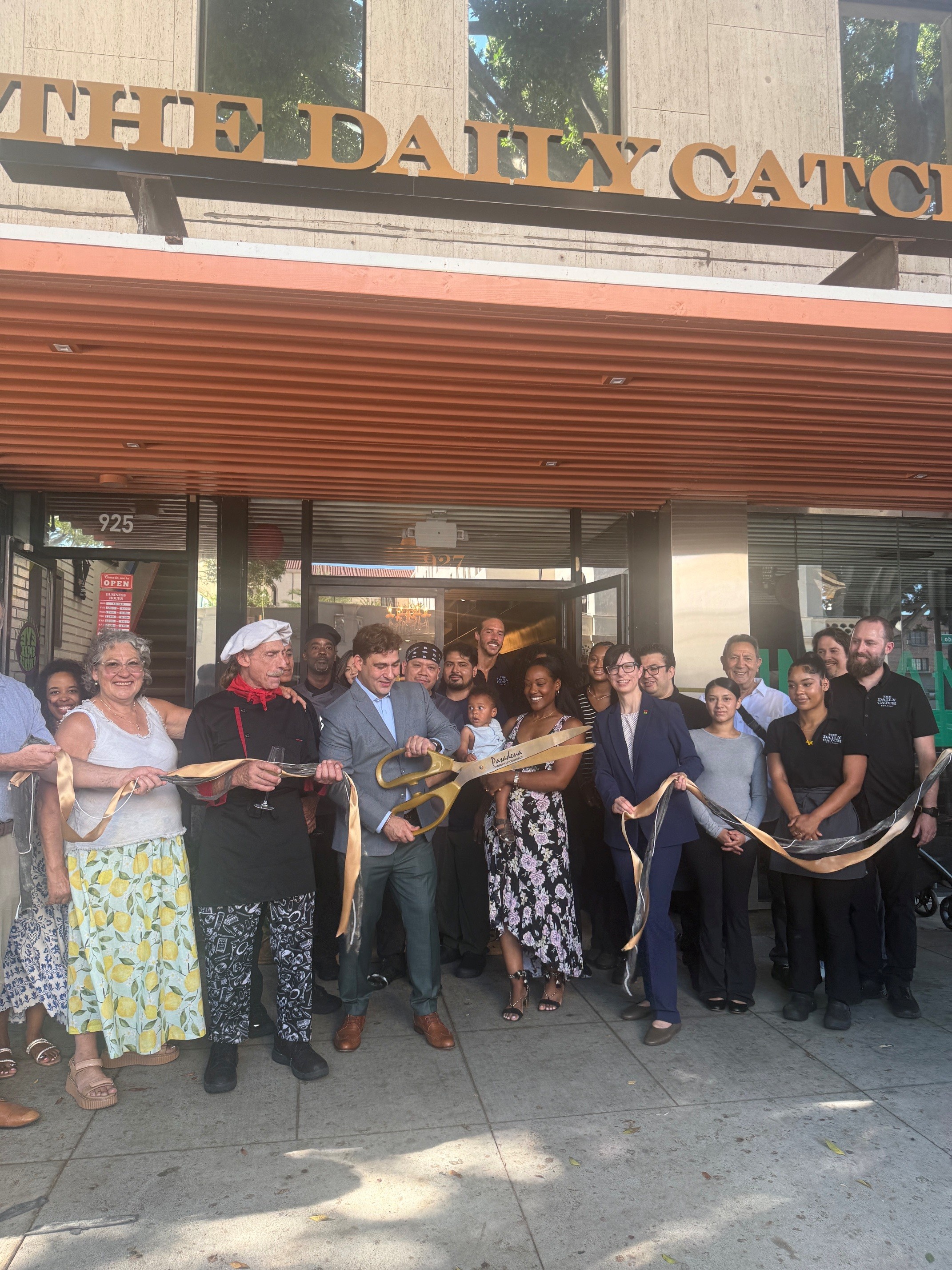 Daily Catch ribbon cutting