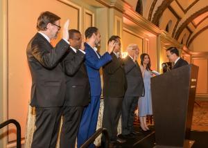 Don Schweitzer swears in Pasadena Chamber Board Officers. 