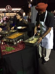 All India Cafe provided samples of South Asian cuisine at the Taste of Pasadena. Photo by Lyd and Mo Photography. All india Cafe at the Taste of Pasadena
