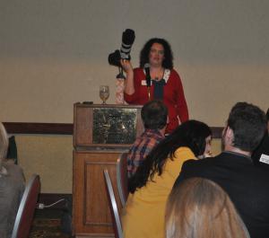 Photographer Nicola Borland explains the difference between a camera and a phone at the January Connection Breakfast.
