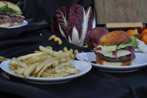 Trattoria Neapolis Burger with cheese fries.