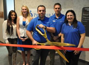 Dr. Raffi Iknadossian cut the ribbon to celebrate the expansion of Premier Wellness Chiropractic.