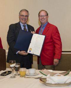 Mayor Tornek presents proclamation to Lance Tibbet.