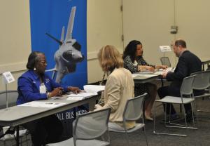 Large companies took part in business matchmaking with potential vendors. Business matchmaking at the Small Business Opportunity Fair