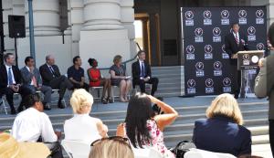 Rafer Johnson (speaking) celebrated the naming of Pasadena as a host city for next year's Special Olympics.