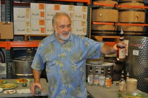 Greg Stark showed off his peated single malt whiskey. Greg Stark and whiskey
