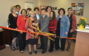 Women at Work Board Chair Marcia Rood cut the ribbon to celebrate the employment assistance and training agencies new offices at 2555 E. Colorado Blvd., Suite 204, in Pasadena